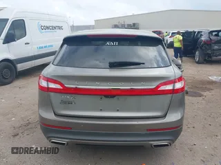 2016 Lincoln MKX Select with VIN 2LMTJ6KR8GBL63843, listed as a IAAI auction lot 41936801 with 96,829 mi miles. Bid and sale history available at carsss.com. Image 16.