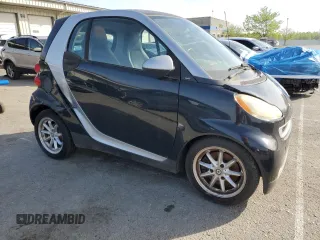 2009 Smart fortwo Pure z VIN WMEEJ31X39K211342, wystawiony jako Copart lot #54104045 z przebiegiem 46 162 mil mil oraz Tytuł czysty. Historia ofert i sprzedaży dostępna na DreamBid. Obrazek 4.