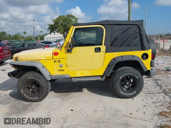 2002 Jeep Wrangler X z VIN 1J4FA39S82P719241, wystawiony jako IAAI lot #42150742 z przebiegiem 147 914 mil mil oraz . Historia ofert i sprzedaży dostępna na DreamBid. Obrazek 14.