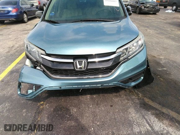 2015 Honda CR-V LX with VIN 5J6RM4H38FL127856, listed as a IAAI auction lot 37426097 with 110,846 mi miles and . Bid and sale history available at DreamBid. Image 12.