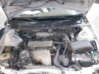 1999 Toyota Camry LE z VIN 4T1BG22K1XU888402, wystawiony jako IAAI lot #42483791 z przebiegiem 149 512 mil mil oraz . Historia ofert i sprzedaży dostępna na DreamBid. Obrazek 10.