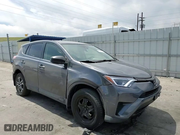 2018 Toyota RAV4 LE with VIN JTMBFREV1JJ746565, listed as a Copart auction lot 58141295 with 93,379 mi miles and Clean title. Bid and sale history available at DreamBid. Image 14.