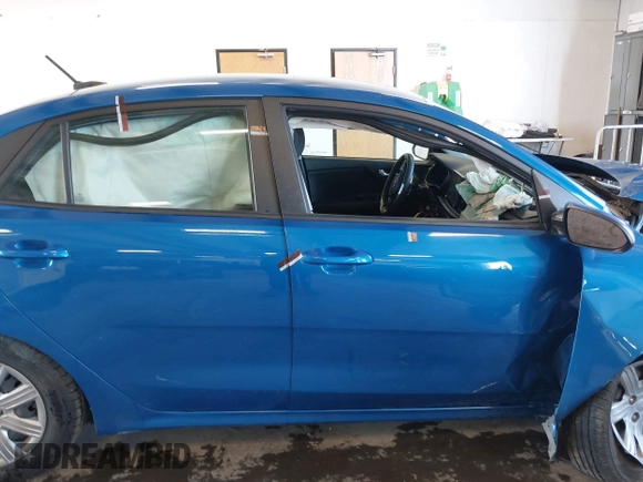 2021 Kia Rio S with VIN 3KPA24AD7ME364789, listed as a IAAI auction lot 42044676 with 54,072 mi miles and . Bid and sale history available at DreamBid. Image 13.