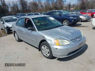 2003 Honda Civic LX with VIN 2HGES16563H574466, listed as a IAAI auction lot 41896754 with 186,457 mi miles. Bid and sale history available at carsss.com. Image 1.