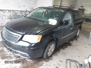 2011 Chrysler Town & Country Touring with VIN 2A4RR5DGXBR745293, listed as a IAAI auction lot 41862089 with 999,999 mi miles. Bid and sale history available at carsss.com. Image 2.