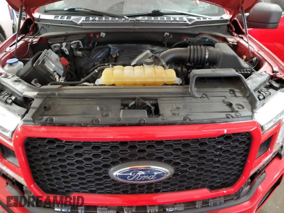 2020 Ford F-150 XL with VIN 1FTEW1E50LKF31657, listed as a Copart auction lot 83083394 with 56,669 mi miles and Salvage title. Bid and sale history available at DreamBid. Image 12.