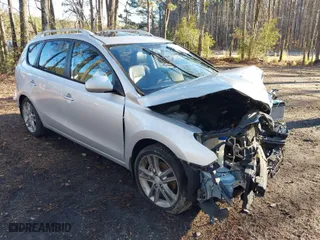2011 Hyundai Elantra Touring GLS with VIN KMHDC8AE7BU101609, listed as a IAAI auction lot 41275542 with 124,206 mi miles. Bid and sale history available at carsss.com. Image 1.