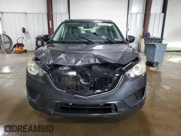 2014 Mazda CX-5 Sport with VIN JM3KE4BEXE0430076, listed as a Copart auction lot 58164695 with 183,130 mi miles and Salvage title. Bid and sale history available at DreamBid. Image 5.