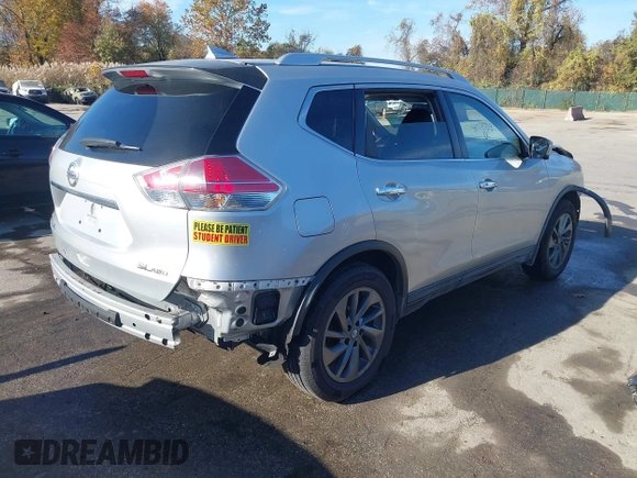 2016 Nissan Rogue SV with VIN KNMAT2MV6GP733975, listed as a IAAI auction lot 40775934 with 68,718 mi miles and . Bid and sale history available at DreamBid. Image 4.