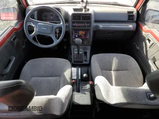 1995 Suzuki Sidekick z VIN JS3TD03V6S4113425, wystawiony jako Copart lot #76973244 z przebiegiem 152 638 mil mil oraz Szkody całkowita. Historia ofert i sprzedaży dostępna na DreamBid. Obrazek 8.