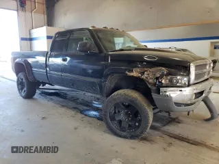2002 Dodge Ram 2500 with VIN 3B7KF23C82M255391, listed as a Copart auction lot 73115584 with 216,242 mi miles and Salvage Title. Bid and sale history available at carsss.com. Image 4.