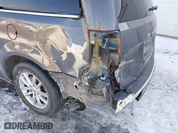 2019 Dodge Grand Caravan SXT with VIN 2C4RDGCG9KR637121, listed as a IAAI auction lot 41636355 with 177,073 mi miles and . Bid and sale history available at DreamBid. Image 6.