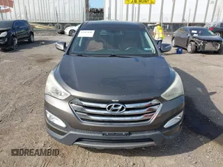 2013 Hyundai Santa Fe Sport z VIN 5XYZW3LA3DG068434, wystawiony jako IAAI lot #42167040 z przebiegiem 140 928 mil mil oraz . Historia ofert i sprzedaży dostępna na DreamBid. Obrazek 13.