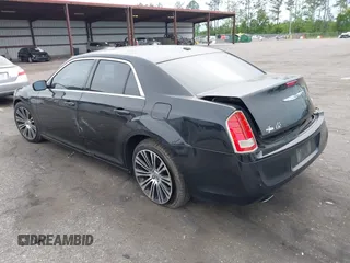2013 Chrysler 300 with VIN 2C3CCABT2DH735764, listed as a IAAI auction lot 41977616 with 164,517 mi miles. Bid and sale history available at carsss.com. Image 3.