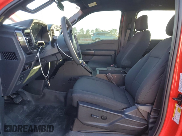 2023 Ford F-150 with VIN 1FTFW1P85PKD82406, listed as a Copart auction lot 84744944 with 32,982 mi miles and Salvage title. Bid and sale history available at DreamBid. Image 7.