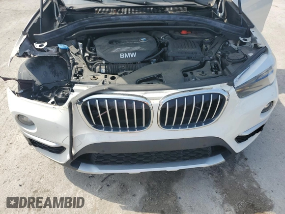 2018 BMW X1 sDrive28i z VIN WBXHU7C30J3H42992, wystawiony jako Copart lot #55065275 z przebiegiem 80 490 mil mil oraz Szkoda całkowita • Salvage title. Historia ofert i sprzedaży dostępna na DreamBid. Obrazek 11.