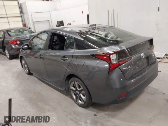 2020 Toyota Prius L Eco with VIN JTDKARFU1L3117299, listed as a IAAI auction lot 42544586 with 42,560 mi miles and . Bid and sale history available at DreamBid. Image 3.