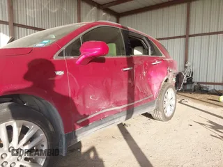 2019 Cadillac XT5 Premium Luxury FWD z VIN 1GYKNERS0KZ157287, wystawiony jako IAAI lot #41106524 z przebiegiem 131 464 mil mil oraz . Historia ofert i sprzedaży dostępna na DreamBid. Obrazek 6.