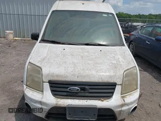 2011 Ford Transit Connect XLT z VIN NM0LS7DN1BT067694, wystawiony jako IAAI lot #42583471 z przebiegiem 167 992 mil mil oraz . Historia ofert i sprzedaży dostępna na DreamBid. Obrazek 6.
