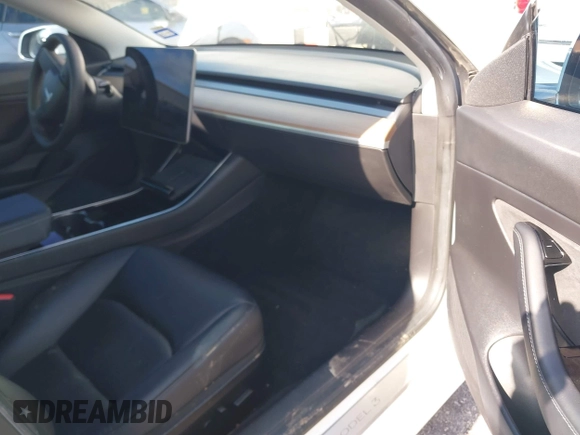 2020 Tesla Model 3 Standard Range Plus with VIN 5YJ3E1EA6LF799620, listed as a IAAI auction lot 42221643 with 55,458 mi miles and . Bid and sale history available at carsss.com. Image 5.