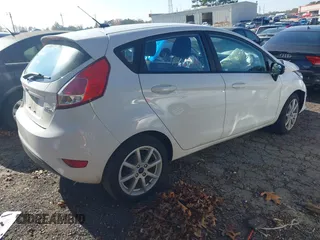 2019 Ford Fiesta SE with VIN 3FADP4EJ9KM123940, listed as a IAAI auction lot 40980644 with 102,240 mi miles. Bid and sale history available at carsss.com. Image 4.