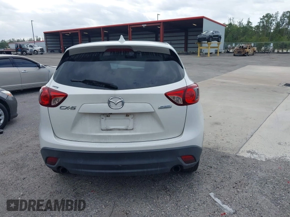 2015 Mazda CX-5 Touring with VIN JM3KE2CY8F0545967, listed as a IAAI auction lot 41909920 with 101,781 mi miles. Bid and sale history available at carsss.com. Image 16.