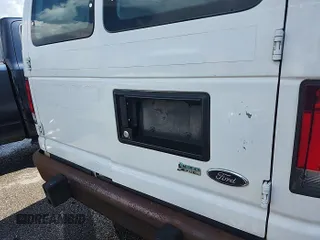 2014 Ford Econoline Cargo Commercial with VIN 1FTNE2EW0EDA53278, listed as a IAAI auction lot 42854412 with 188,803 mi miles and . Bid and sale history available at DreamBid. Image 7.