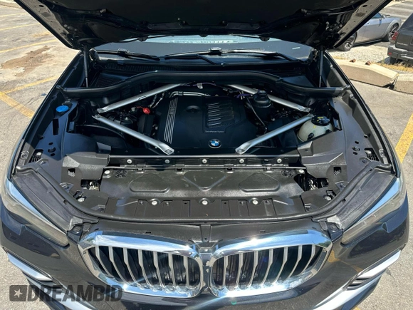 2023 BMW X5 xDrive40i with VIN 5UXCR6C06P9P36608, listed as a Copart auction lot 63257435 with 65,824 mi miles and Clean title. Bid and sale history available at DreamBid. Image 5.