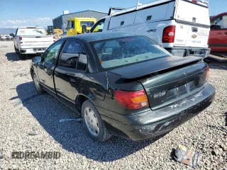 2000 Saturn SL with VIN 1G8ZH5285YZ240565, listed as a Copart auction lot 66567153 with 202,109 mi miles and Salvage title. Bid and sale history available at DreamBid. Image 2.