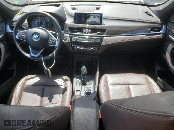 2020 BMW X1 xDrive28i с VIN WBXJG9C06L5R54942, выставлен на аукционе Copart как лот 54262435 с пробегом 65 217 миль миль и Списание • Salvage title. История ставок и продаж доступна на DreamBid. Изображение 8.