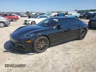 2018 Porsche Panamera 4S с VIN WP0AB2A74JL132832, выставлен на аукционе Copart как лот 45211455 с пробегом 62 463 миль миль и Списание • Salvage title. История ставок и продаж доступна на DreamBid. Изображение 1.