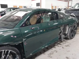 2021 Audi R8 z VIN WUAKBAFX3M7900923, wystawiony jako IAAI lot #41248773 z przebiegiem 7 048 mil mil oraz . Historia ofert i sprzedaży dostępna na DreamBid. Obrazek 18.