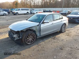 2016 BMW 3 Series 328i with VIN WBA8E9G50GNT47543, listed as a IAAI auction lot 41101803 with 150,202 mi miles. Bid and sale history available at carsss.com. Image 2.