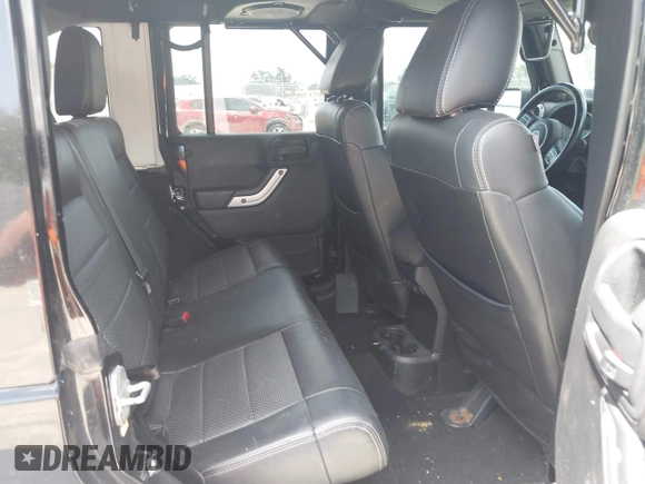 2012 Jeep Wrangler Unlimited Altitude with VIN 1C4HJWEG5CL161049, listed as a IAAI auction lot 42629330 with 217,147 mi miles and . Bid and sale history available at DreamBid. Image 8.