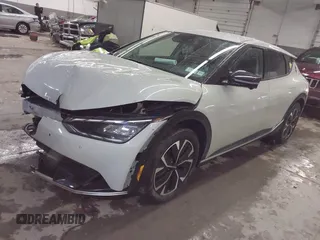 2022 Kia EV6 Wind z VIN KNDC3DLC5N5088331, wystawiony jako IAAI lot #41683097 z przebiegiem 37 380 mil mil oraz . Historia ofert i sprzedaży dostępna na DreamBid. Obrazek 2.
