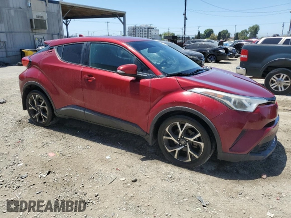 2018 Toyota C-HR XLE with VIN NMTKHMBX7JR011965, listed as a Copart auction lot 56213215 with 147,243 mi miles and Salvage Title. Bid and sale history available at DreamBid. Image 4.