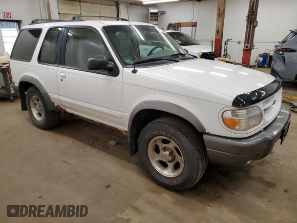 1999 Ford Explorer z VIN 1FMZU24E6XUC14115, wystawiony jako Copart lot #77702694 z przebiegiem 169 783 mil mil oraz Czysty tytuł • Clean title. Historia ofert i sprzedaży dostępna na DreamBid. Obrazek 4.