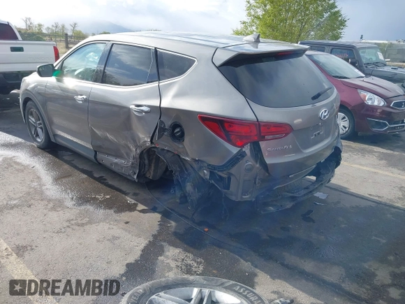 2017 Hyundai Santa Fe 2.4L with VIN 5XYZTDLB9HG440064, listed as a IAAI auction lot 42061524 with 140,365 mi miles and . Bid and sale history available at DreamBid. Image 3.