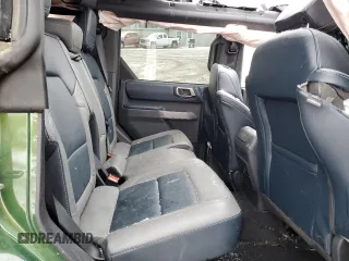 2023 Ford Bronco с VIN 1FMEE5DP7PLB60568, выставлен на аукционе Copart как лот 87751615 с пробегом 25 681 миль миль и На запчасти • Non repairable. История ставок и продаж доступна на DreamBid. Изображение 12.