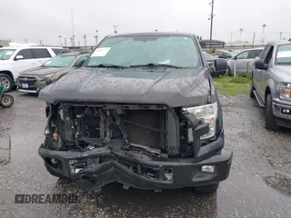2015 Ford F-150 XL with VIN 1FTEW1CGXFKD98530, listed as a IAAI auction lot 41687753 with 104,281 mi miles. Bid and sale history available at carsss.com. Image 12.