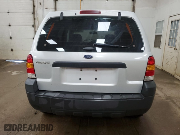 2005 Ford Escape XLS Value z VIN 1FMYU02Z55KA45705, wystawiony jako Copart lot #57244345 z przebiegiem Nie podano mil oraz Czysty tytuł • Clean title. Historia ofert i sprzedaży dostępna na DreamBid. Obrazek 6.