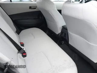 2022 Toyota Corolla Cross LE with VIN 7MUCAABG8NV004527, listed as a IAAI auction lot 42259519 with 15,211 mi miles and . Bid and sale history available at DreamBid. Image 8.