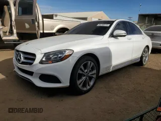 2018 Mercedes-Benz C 300 with VIN 55SWF4JB9JU261063, listed as a Copart auction lot 84748174 with 69,808 mi miles and Salvage title. Bid and sale history available at DreamBid. Image 1.