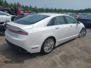 2015 Lincoln MKZ z VIN 3LN6L2G96FR625086, wystawiony jako IAAI lot #42406467 z przebiegiem 24 130 mil mil oraz . Historia ofert i sprzedaży dostępna na DreamBid. Obrazek 4.