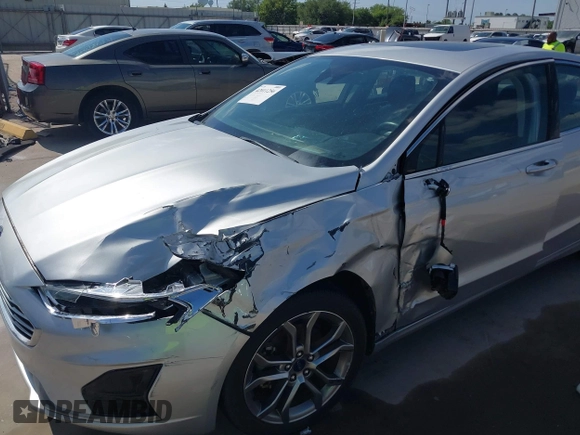 2019 Ford Fusion SEL with VIN 3FA6P0CD2KR116863, listed as a IAAI auction lot 42011256 with 72,676 mi miles. Bid and sale history available at carsss.com. Image 6.
