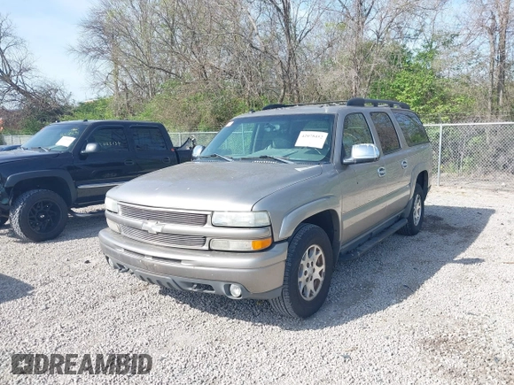 2003 Chevrolet Suburban Z71 with VIN 3GNFK16Z73G190936, listed as a IAAI auction lot 42078452 with 231,121 mi miles. Bid and sale history available at carsss.com. Image 2.