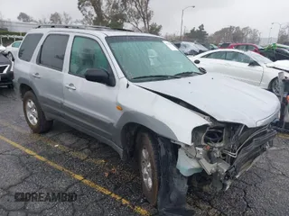 2001 Mazda Tribute LX with VIN 4F2YU09151KM22080, listed as a IAAI auction lot 41549617 with 164,975 mi miles and . Bid and sale history available at carsss.com. Image 1.