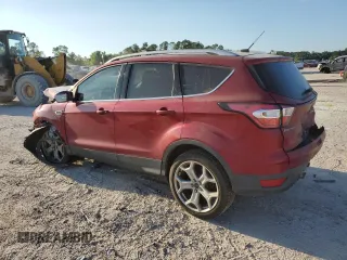 2017 Ford Escape Titanium with VIN 1FMCU0J97HUD52930, listed as a Copart auction lot 71851014 with 101,467 mi miles and Salvage Title. Bid and sale history available at carsss.com. Image 2.