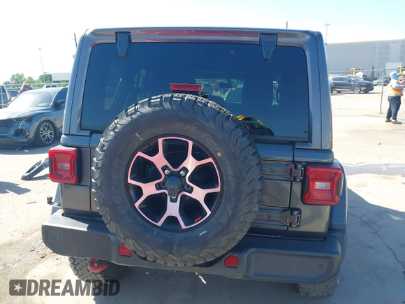 2020 Jeep Wrangler Unlimited Rubicon z VIN 1C4HJXFN0LW300344, wystawiony jako IAAI lot #41943662 z przebiegiem 59 051 mil mil oraz . Historia ofert i sprzedaży dostępna na DreamBid. Obrazek 16.