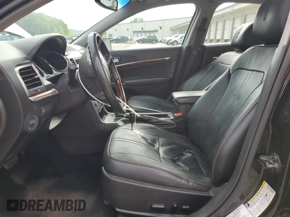 2012 Lincoln MKZ with VIN 3LNHL2JC3CR828543, listed as a Copart auction lot 56451355 with 127,865 mi miles and Salvage title. Bid and sale history available at DreamBid. Image 7.